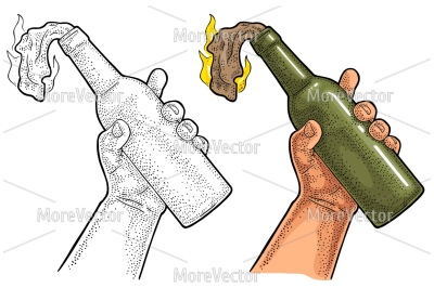Male hand holding Molotov Cocktail. 