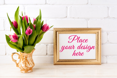 Golden landscape frame mockup with bright pink tulips bouquet