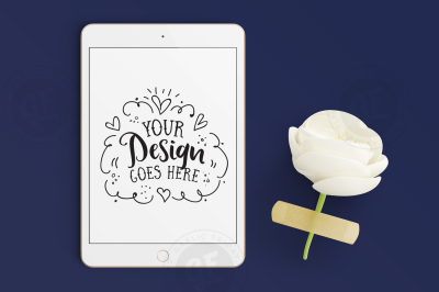 iPad Mini with flower on navy background