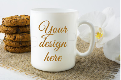 Coffee mug mockup with cookies