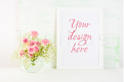 White frame mockup with&amp;nbsp; pink rose flowers.