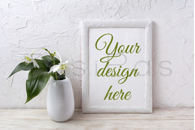 White frame mockup with euxaris flower in vase