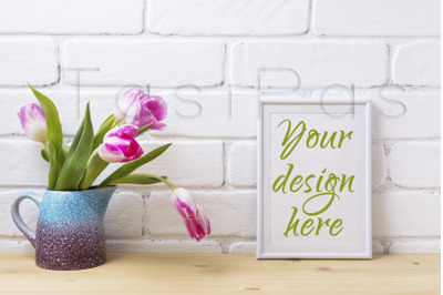 White small frame mockup with pink tulip in purple blue vase