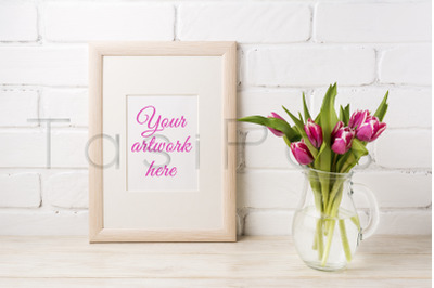 Wooden frame mockup with magenta pink tulips in glass pitcher jar.