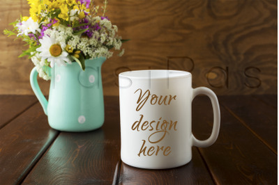 White coffee mug rustic mockup with wildflowers in mint green vase