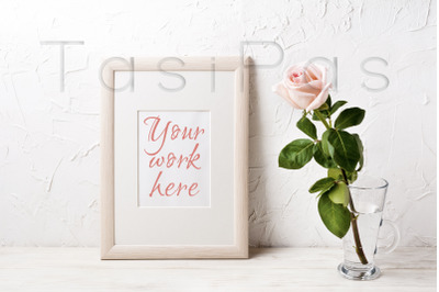 Wooden frame mockup with pink rose