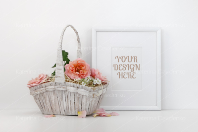 Blank picture frame mockup with a basket of roses