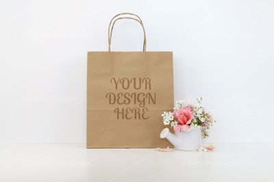 Craft paper bag mockup with flowers