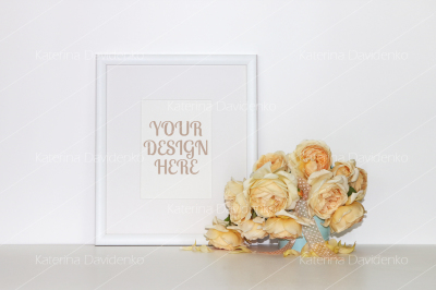 Picture frame mockup with a bouquet of yellow roses