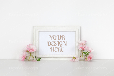 horizontal wooden frame mockup, little bottles with pink flowers, whit