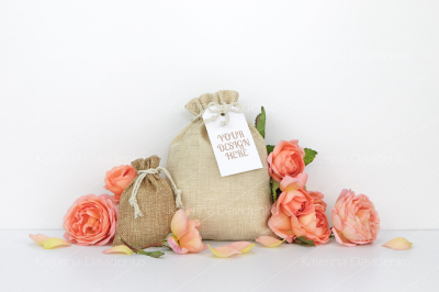 Bags with a tag mockup, orange roses