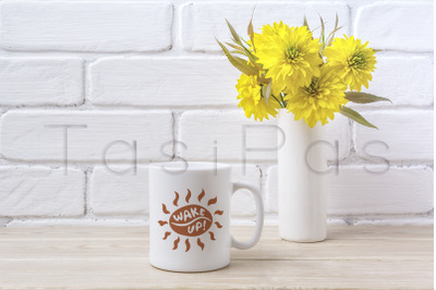 White coffee mug mockup with Golden Ball flower
