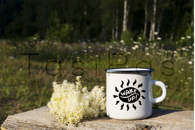 White campfire enamel mug mockup with white flowers.