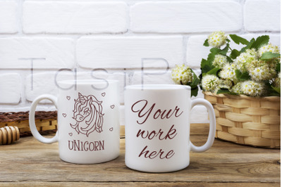 Two coffee mug mockup with basket of flowers