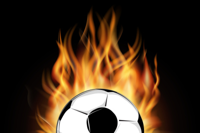 Burning soccer ball isolated over black background