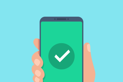 Checkmark on smartphone screen. Green confirmation notification on mob