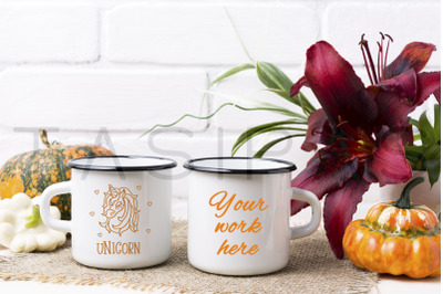 Two white campfire enamel mug mockup with pumpkin and lily.