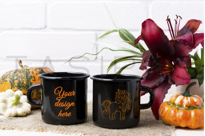 Two black campfire enamel mug mockup with pumpkin and red lily.
