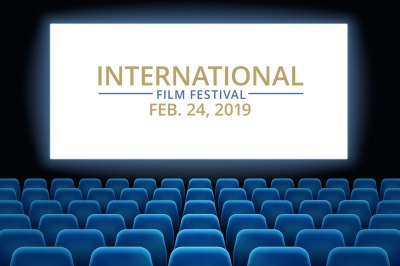 Film festival. Movie theater hall with white screen. Cinema internatio