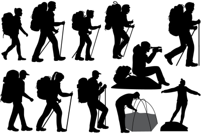 Silhouettes of hiking people