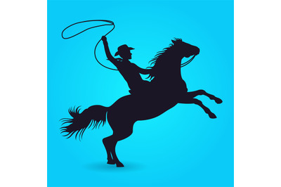 Silhouette of cowboy with lasso riding on horse