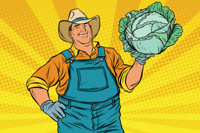 Rural retro farmer and a head of green cabbage