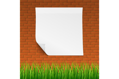 Red brick callboard with clean banner and grass