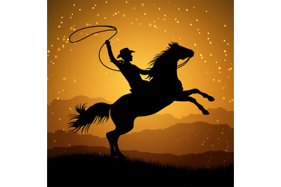 Silhouette of cowboy with lasso on rearing horse