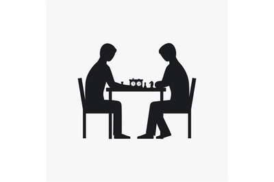 Two people playing chess silhouette