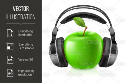 Realistic headphones and green apple