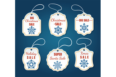 Christmas sale tags on blue background