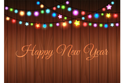 Glowing garland on wood background