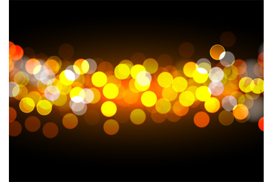 Golden bokeh lights on black background