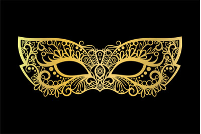 Golden carnival mask on black background