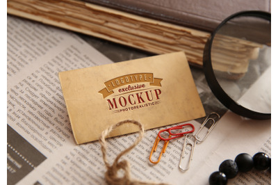 Photorealistic mock-ups with old book and papers on background