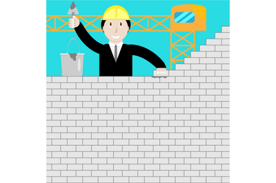 Businessman building a brick wall