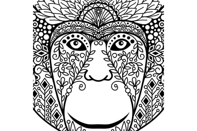 Zentagle monkey head with ethnic motifs.