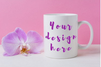 White coffee mug mockup with purple orchid