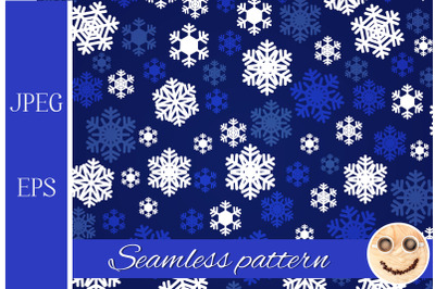 Navy blue and white snowflakes seamless pattern.