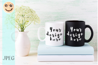 White and black mug mockup with books and white flowers