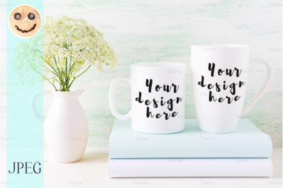 Two white mugs mockup with books and white flowers in pitcher