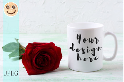 White coffee mug mockup with dark red rose