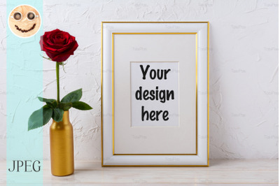 Frame mockup with burgundy red rose in golden vase