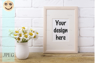 Wooden frame mockup with chamomile bouquet in rustic vase