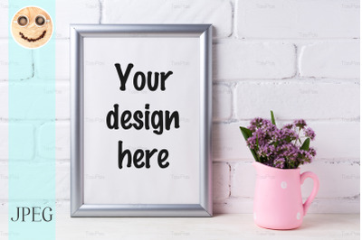 Silver frame mockup with purple flowers in pink rustic pitcher