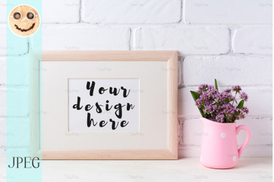 Wooden landscape frame mockup with purple flowers in pink rustic pitch