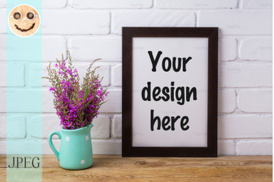 Black brown  frame mockup with maroon purple flowers in mint pitcher