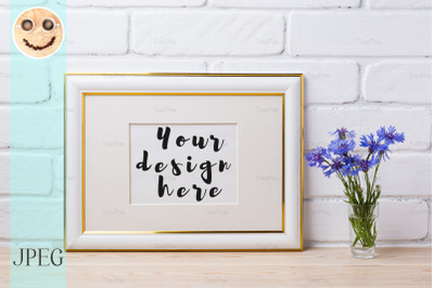 Gold decorated frame mockup with cornflower