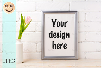 Silver frame mockup with tender soft pink tulip