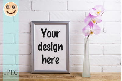 Silver frame mockup with tender pink orchid